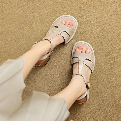 Genuine leather gladiator sandals with chunky heel, open-toe design, and secure buckle strap closure for summer style