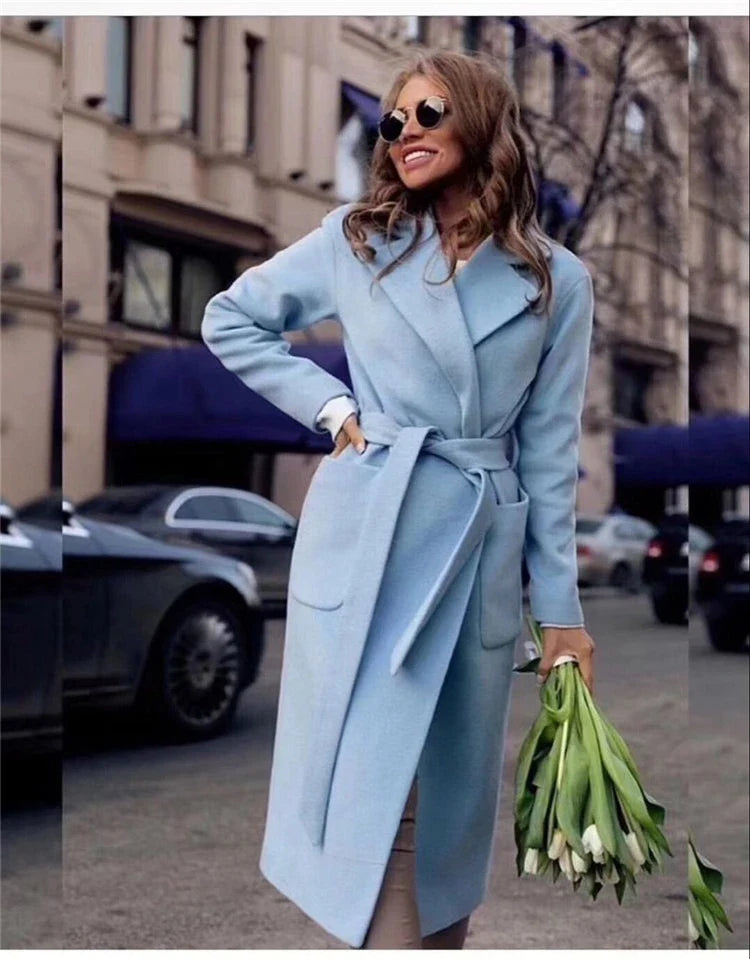 Navy blue woolen coat with a lapel tie accent, perfect for elevating any outfit