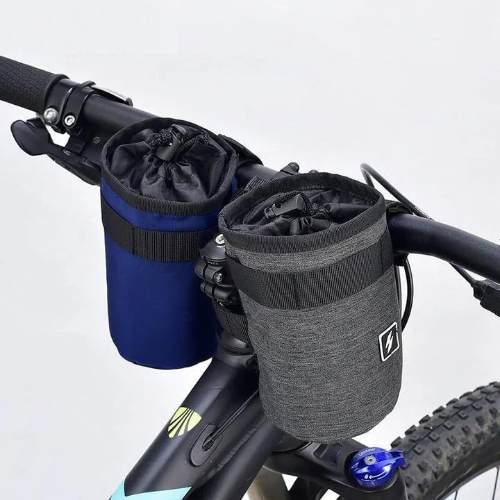 Insulated gray handlebar bag securely holding a 750ml water bottle, designed for easy access to hydration while cycling