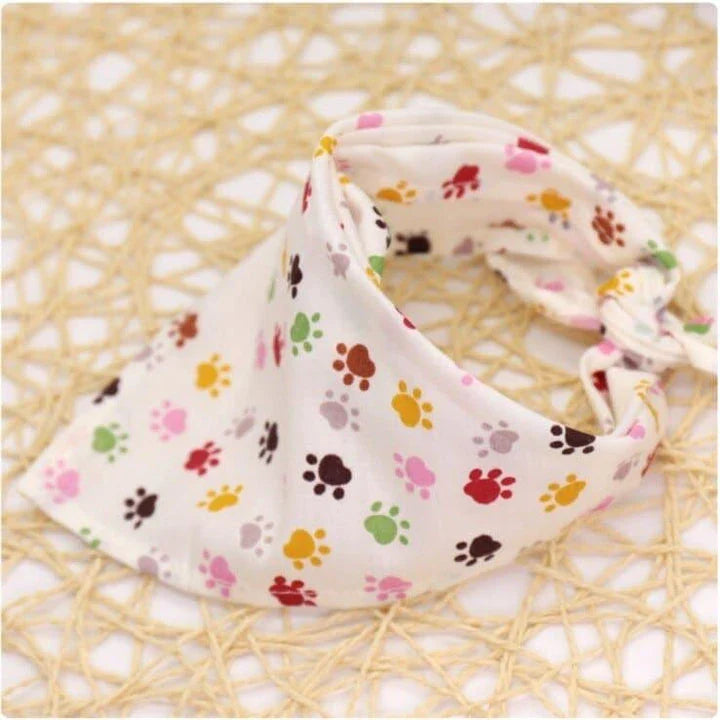 Adorable Cartoon Patterned Triangular Dog Scarf in vibrant colors, perfect for keeping your pup warm and stylish