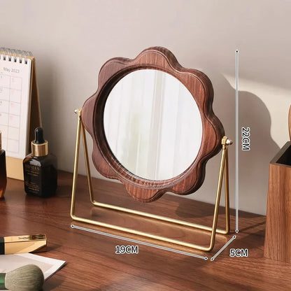 Elegant bronze rotatable desktop makeup mirror with a neoclassical design, perfect for a vanity or desk