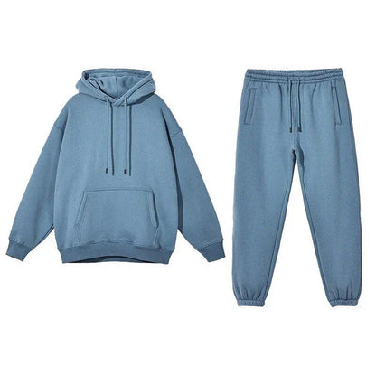 Cozy Fleece Hoodie and Sweatpants Set in Light Pink, featuring a relaxed fit and hooded design for maximum comfort and style.