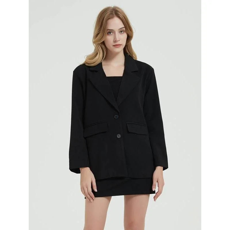 Elegant women's black blazer coat with a turn-down collar, single-breasted closure, and practical pockets for a polished, professional look.