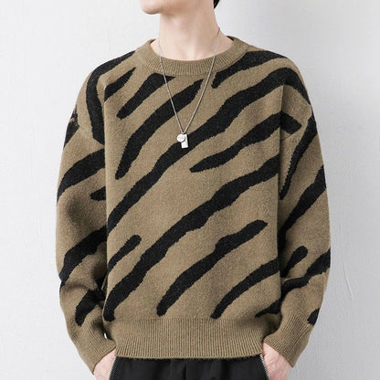 Cozy velvet sweater in sand brown color, featuring a soft, velvety texture and thick, insulating fabric for warmth and style.