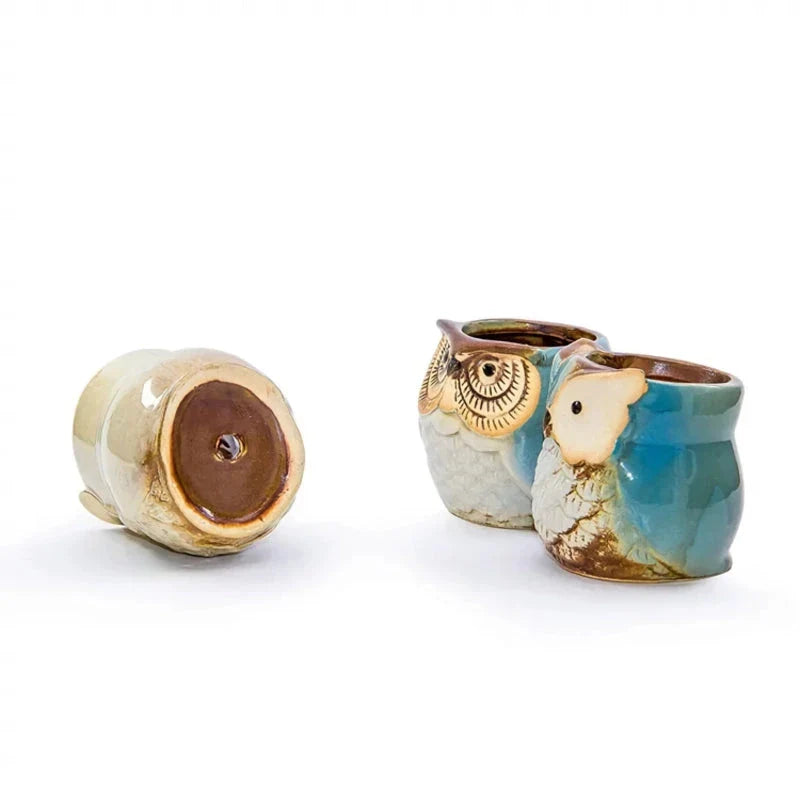 Adorable mini owl-shaped ceramic planter for small plants and succulents, featuring vibrant colors and vintage charm