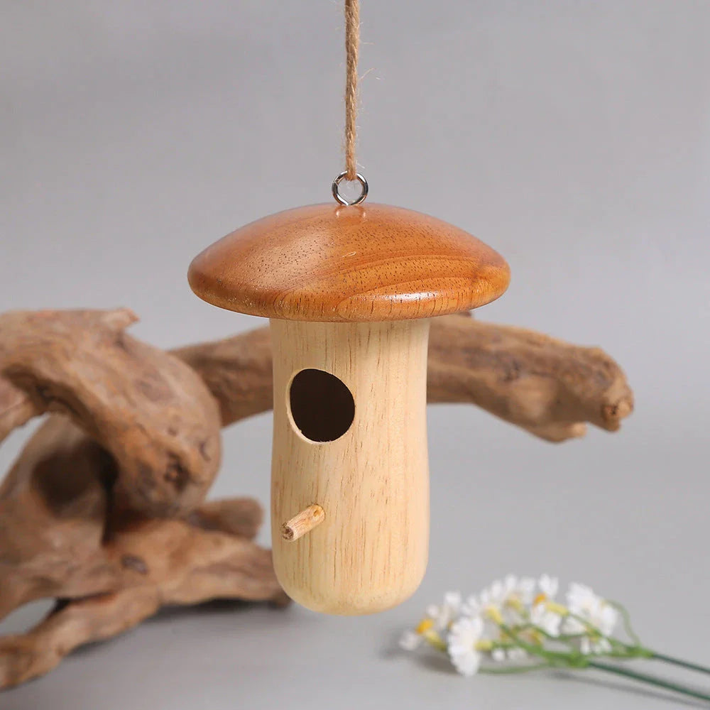 A decorative wooden hummingbird nest with a classic rustic design, perfect for attracting and providing a cozy retreat for hummingbirds in your outdoor garden.