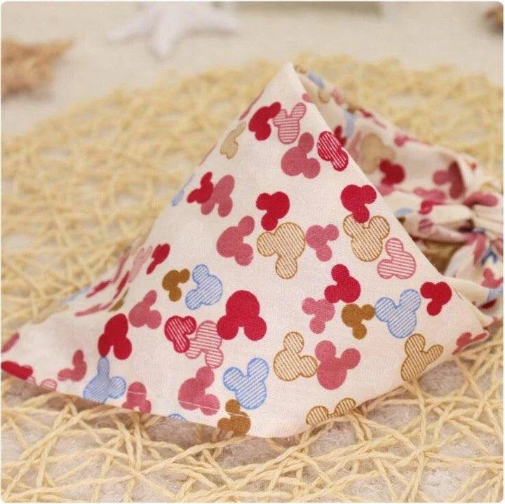 Adorable Cartoon Patterned Triangular Dog Scarf in vibrant colors, perfect for keeping your pup warm and stylish