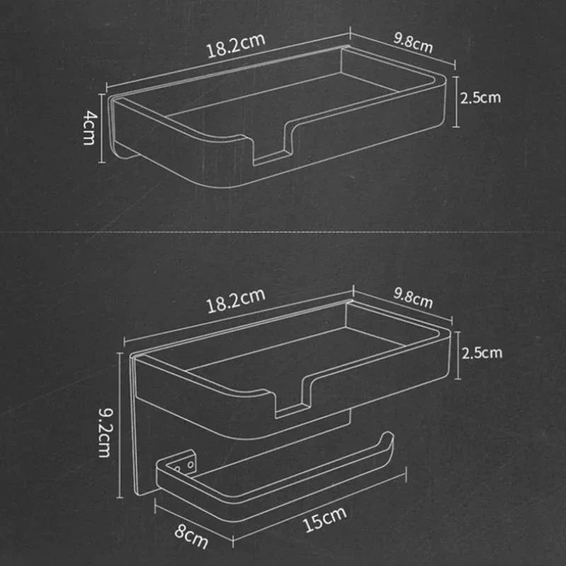 Black and gold aluminum bathroom paper holder with a convenient phone shelf, a stylish and functional accessory for modern bathrooms.