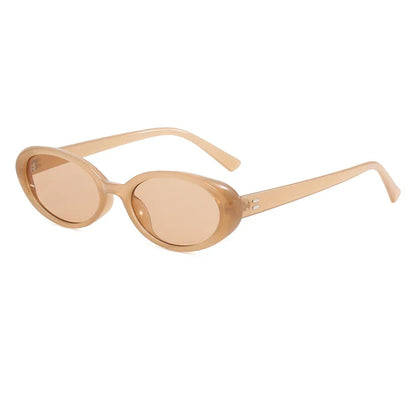 Chic oval sunglasses with white grey acetate frames and polycarbonate lenses, designed for fashionable women to shield their eyes from UV rays in style.