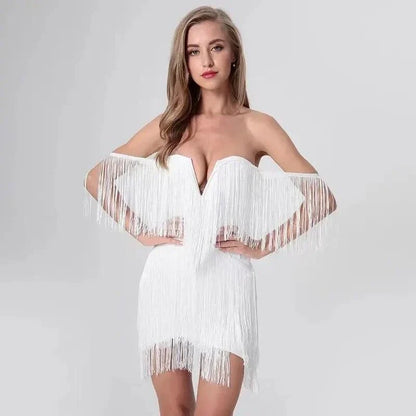 Elegant tassel-embellished bodycon mini dress in black, red, and white colors for glamorous occasions