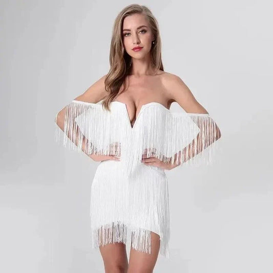 Elegant tassel-embellished bodycon mini dress in black, red, and white colors for glamorous occasions