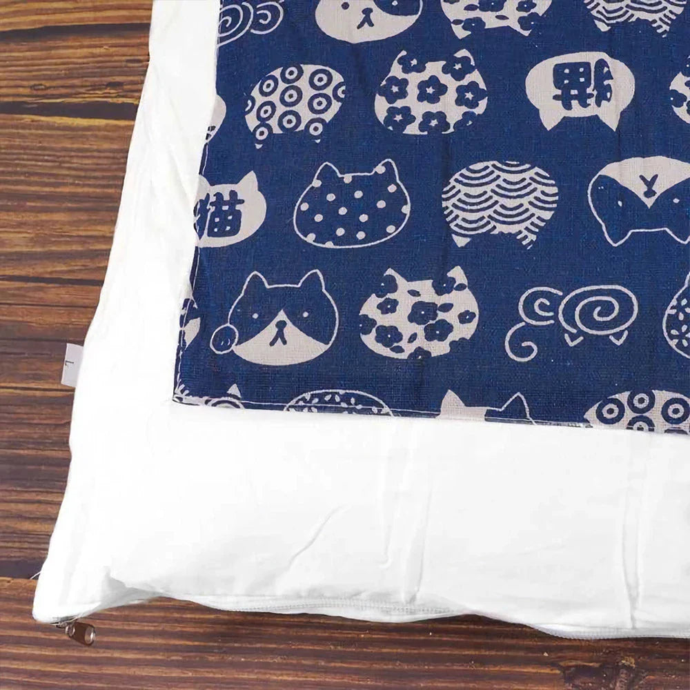 Cozy cat cave bed with a printed design, providing a plush and secure retreat for your feline friend.
