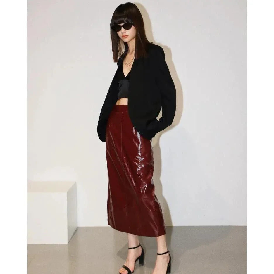 Reflective leather midi pencil skirt with a flattering high-waist design and eye-catching reflective material