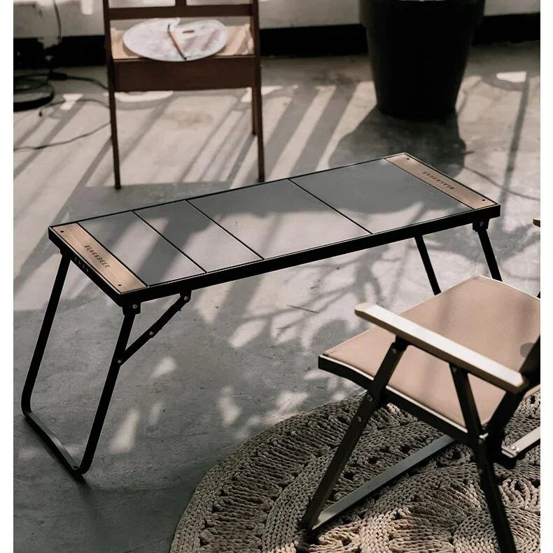 Portable Camping Folding Table with Integrated BBQ Grill made of Aluminum Alloy and Wood, perfect for outdoor adventures and picnics