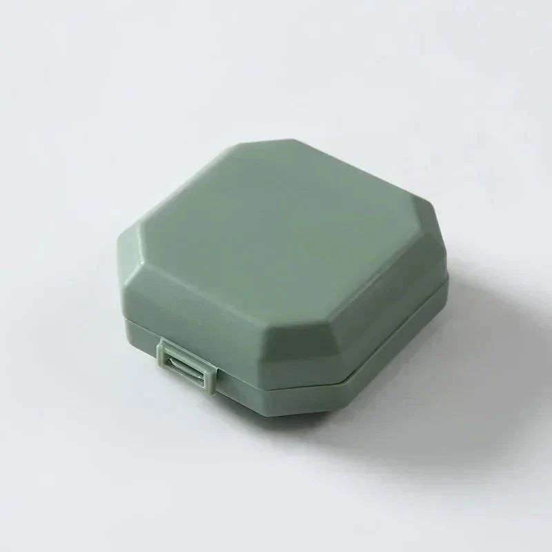 Compact Portable Pill Box with 6 Compartments for Organizing Medication on the Go