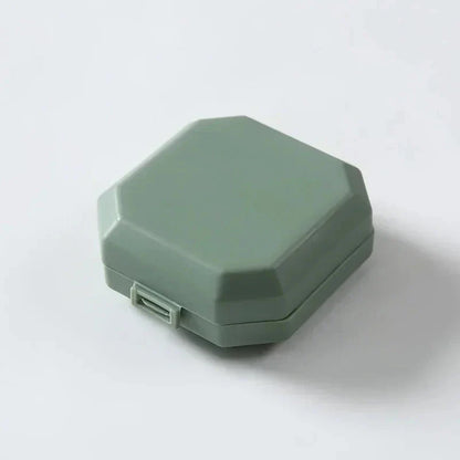 Compact Portable Pill Box with 6 Compartments for Organizing Medication on the Go