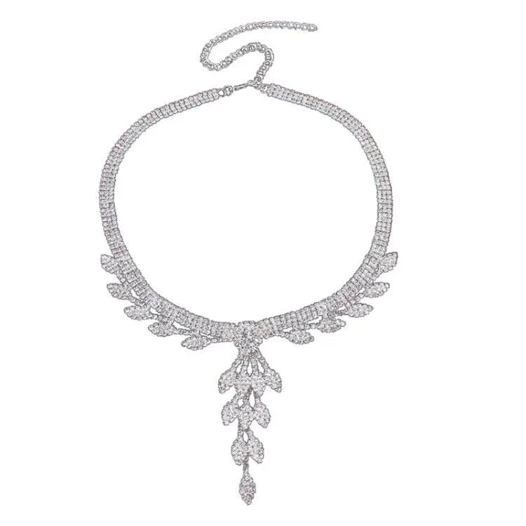 Elegant handcrafted rhinestone jewelry set for women, including a necklace and earrings with a delicate floral pattern and sparkling rhinestones