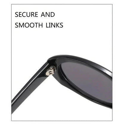 Chic oval sunglasses with white grey acetate frames and polycarbonate lenses, designed for fashionable women to shield their eyes from UV rays in style.