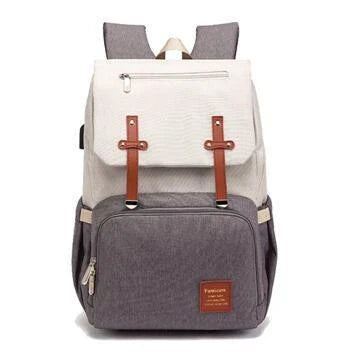 Premium diaper backpack with insulated pockets, stroller attachment, and USB charging port