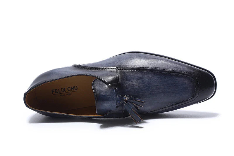 Premium casual leather loafers for men in black, brown, and blue colors with a sleek, low-profile design and durable rubber soles