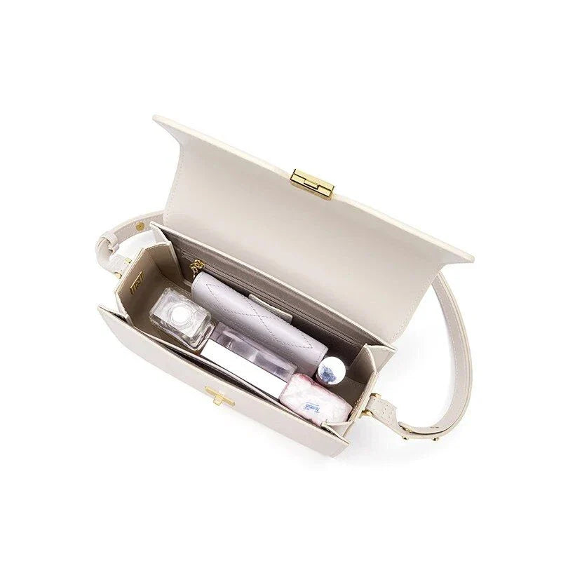 Elegant and sophisticated cow leather women's shoulder and crossbody bag with adjustable strap and spacious interior