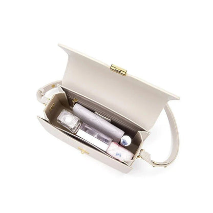 Elegant and sophisticated cow leather women's shoulder and crossbody bag with adjustable strap and spacious interior