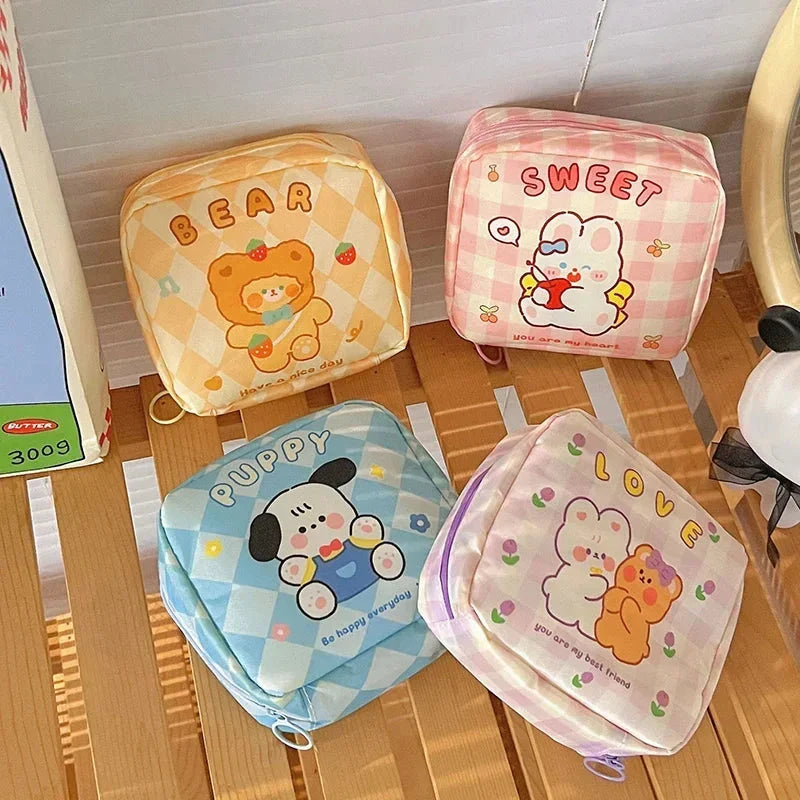 Adorable cartoon nylon cosmetic bag with secure zipper closure and compact, box-shaped design