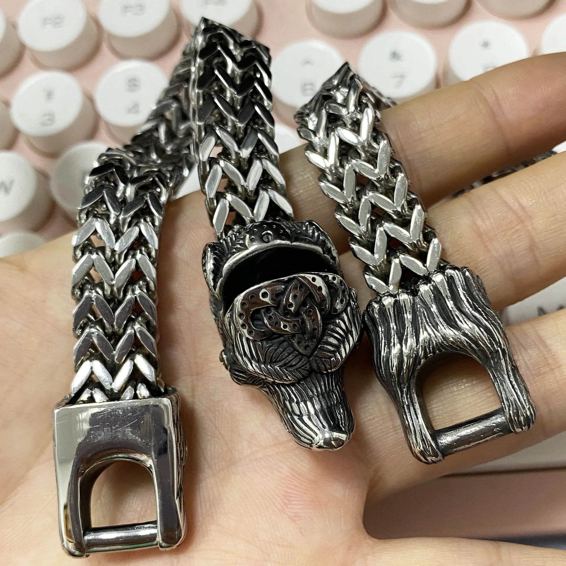 Titanium steel Viking-inspired bracelet with a polished finish and bear design, perfect for modern men seeking a bold, retro-punk accessory.