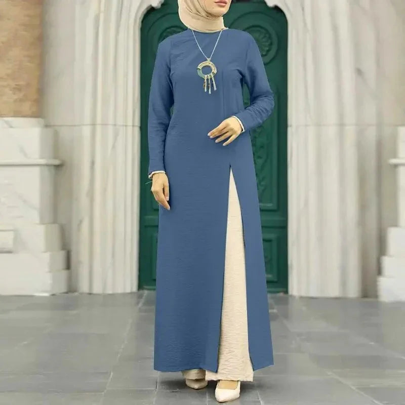 Elegant polyester dress with long sleeves, high slit hem, and available in caramel, black, blue, green, and pink colors