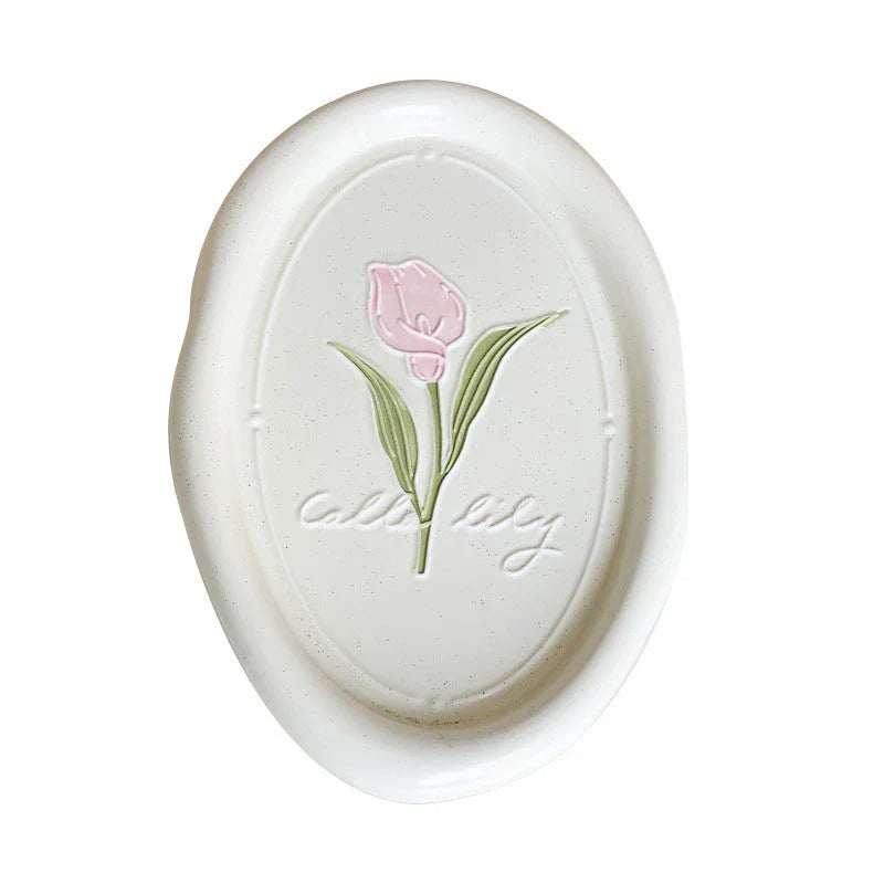 Elegant ceramic plate with French-inspired Calla Tulip floral relief pattern, perfect for formal and casual dining settings