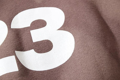 Cozy loose knit sweaters in a rich coffee color with a relaxed, oversized fit for ultimate comfort and style.