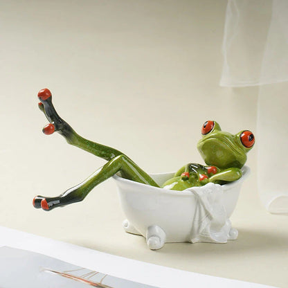 Resin frog figurines in a bathtub, adding a playful touch to bathroom decor