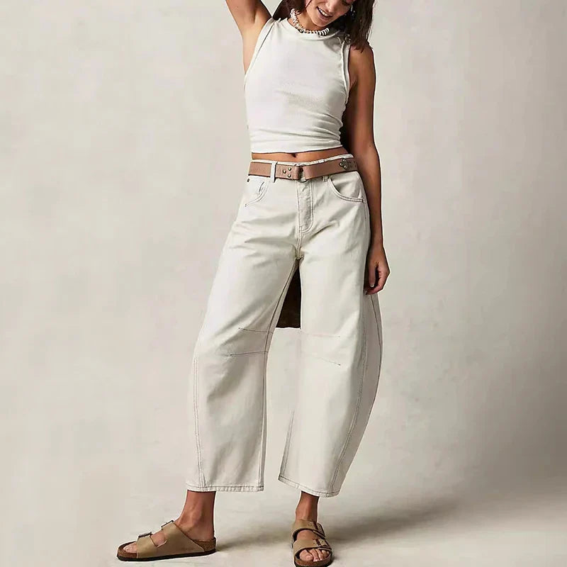 Trendha wide-leg summer pants in light blue, white, and black colors with a relaxed, stylish design