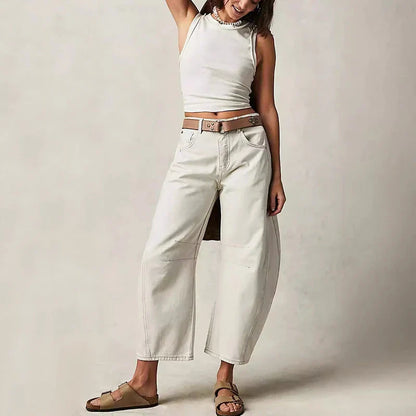 Trendha wide-leg summer pants in light blue, white, and black colors with a relaxed, stylish design