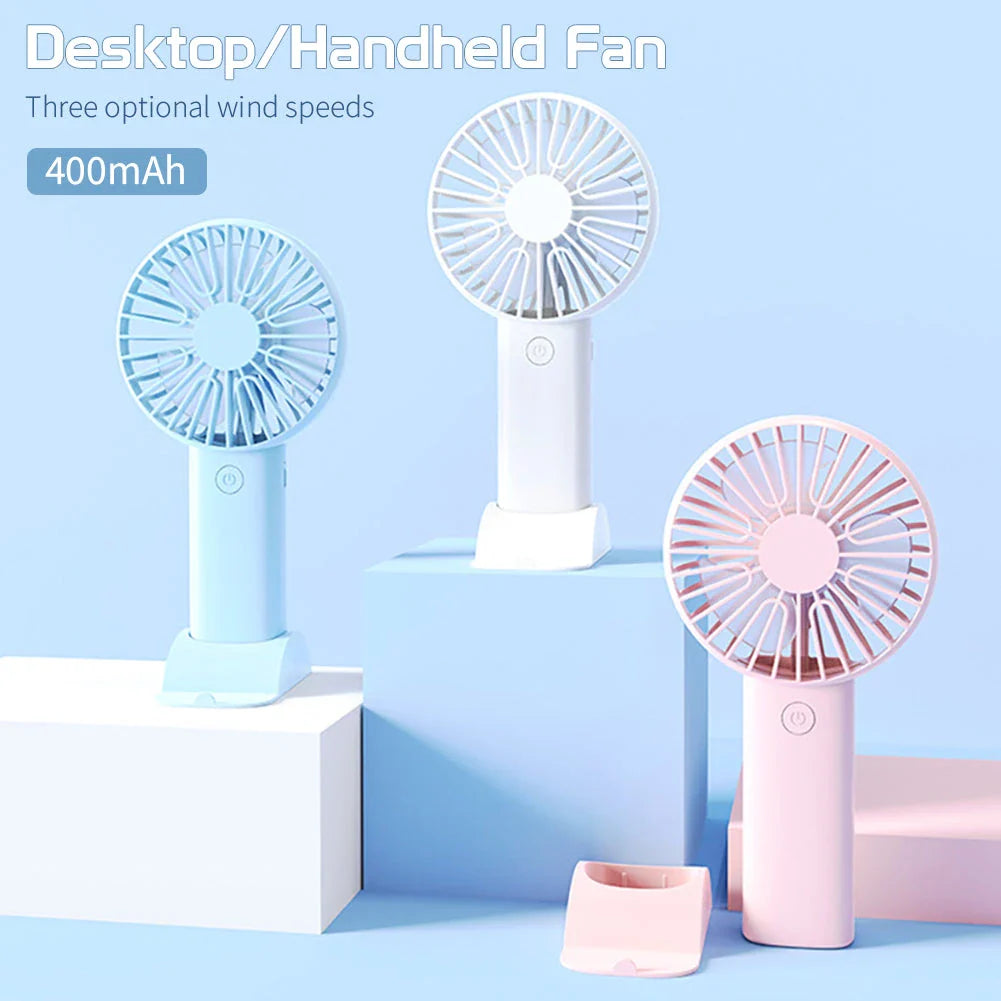 Compact USB Rechargeable Mini Handheld Fan with 3 wind modes, desktop stand, and phone holder for cooling anywhere