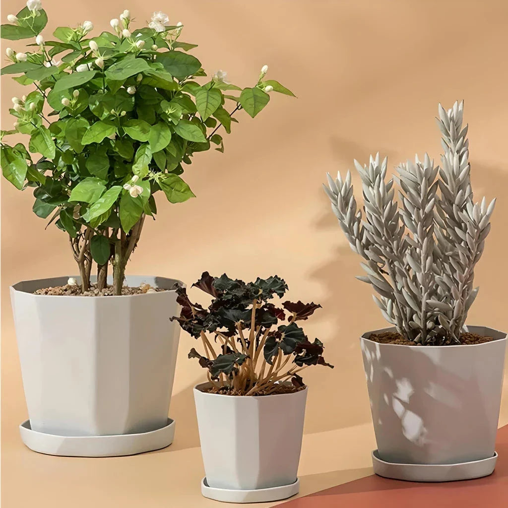 Elegant Nordic-style resin flower pot with a minimalist design, perfect for displaying indoor plants and adding a touch of Scandinavian charm to any room.