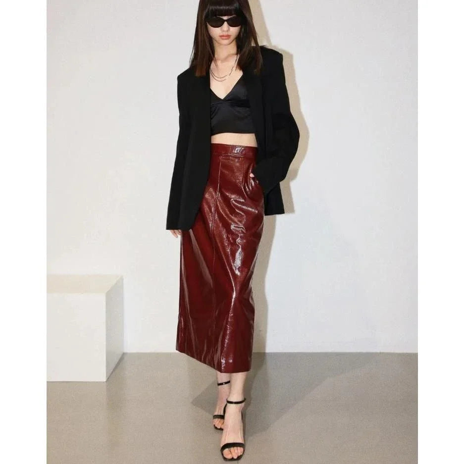 Reflective leather midi pencil skirt with a flattering high-waist design and eye-catching reflective material