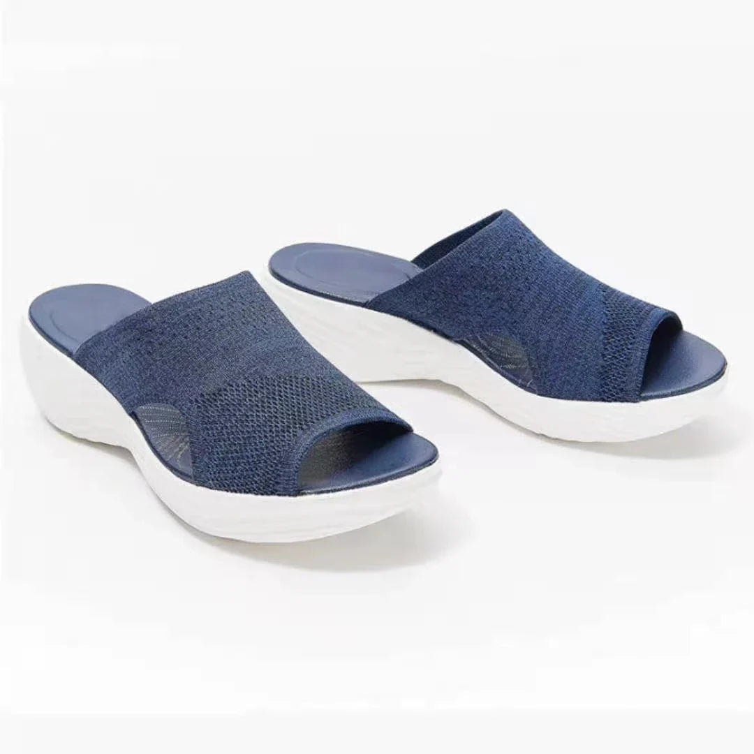 Comfortable plus-size women's sandals in various colors, featuring a fashionable and supportive design for warm-weather activities.