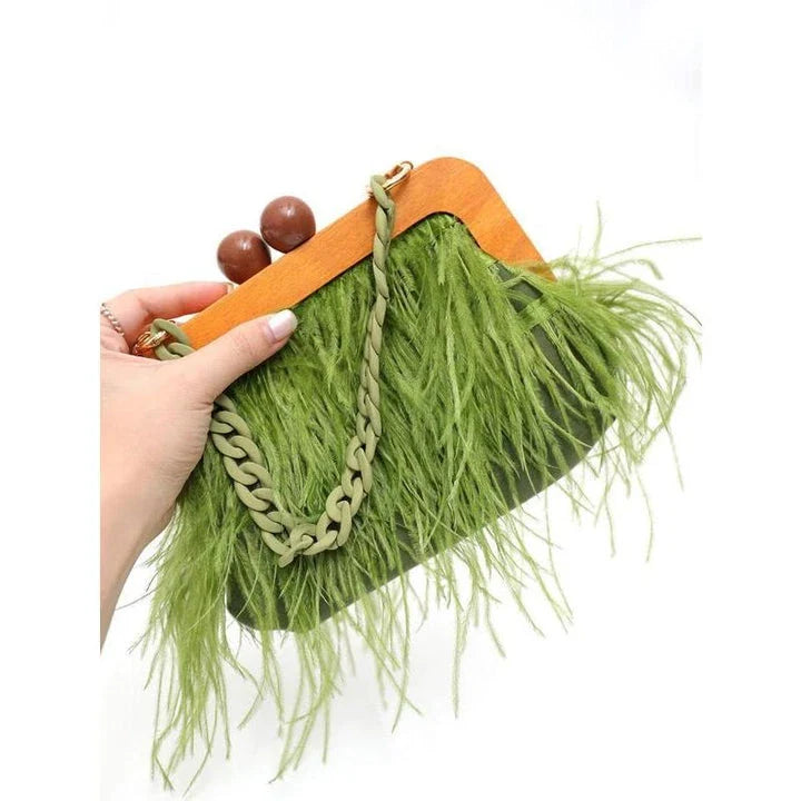 Elegant green feather evening clutch with chic acrylic chain, a stylish and practical accessory for formal and casual events