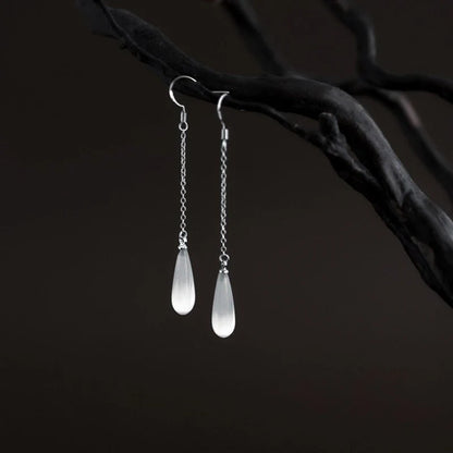 925 Sterling Silver Opal Drop Earrings with a sleek and sophisticated design, perfect for adding a touch of elegance to any outfit.