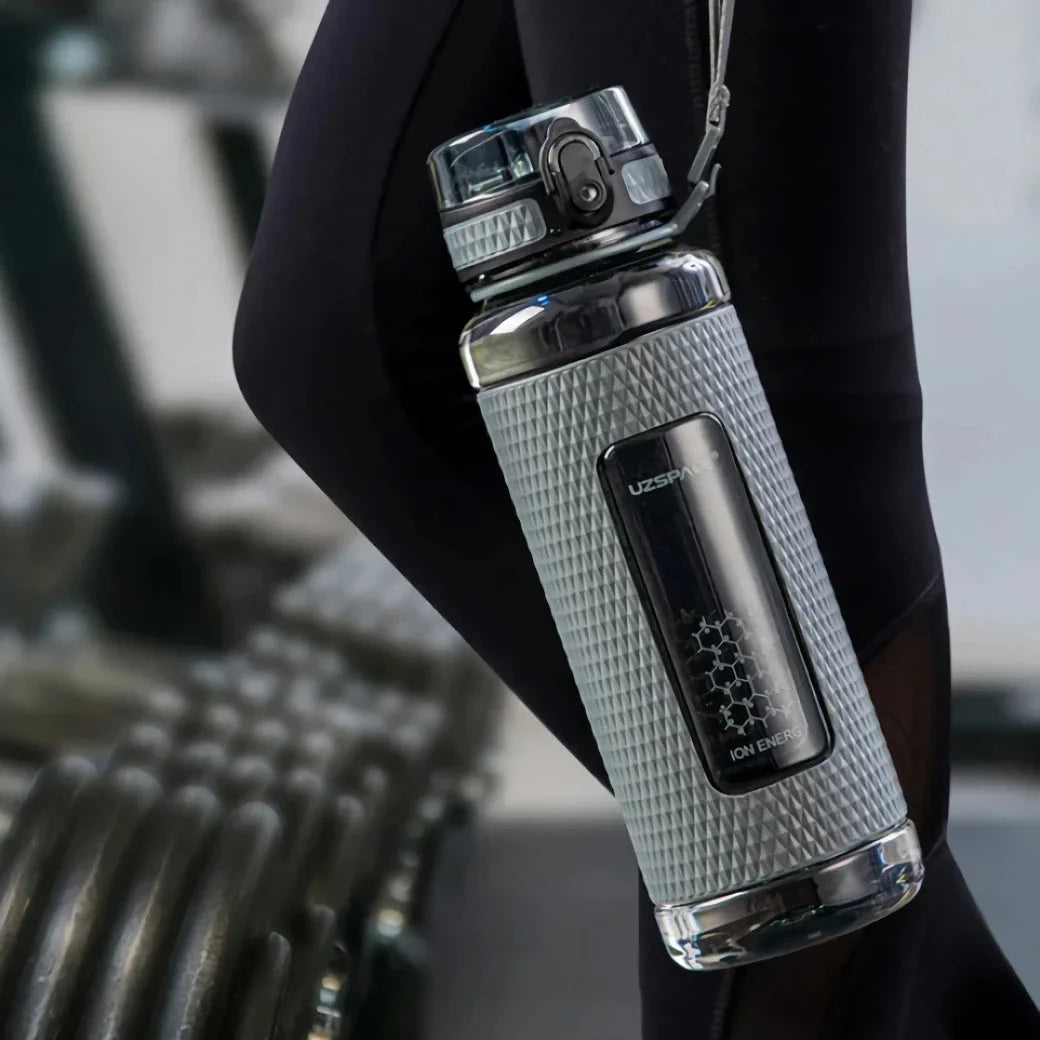 Portable sports water bottle with wide mouth, tea infuser, and leak-proof design for active lifestyles
