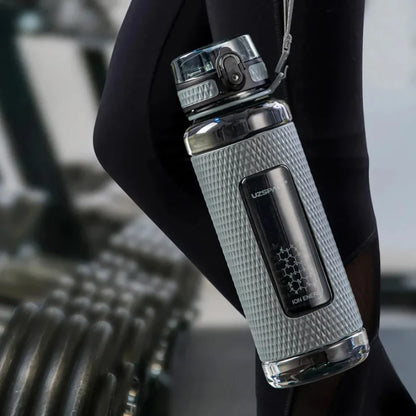Portable sports water bottle with wide mouth, tea infuser, and leak-proof design for active lifestyles