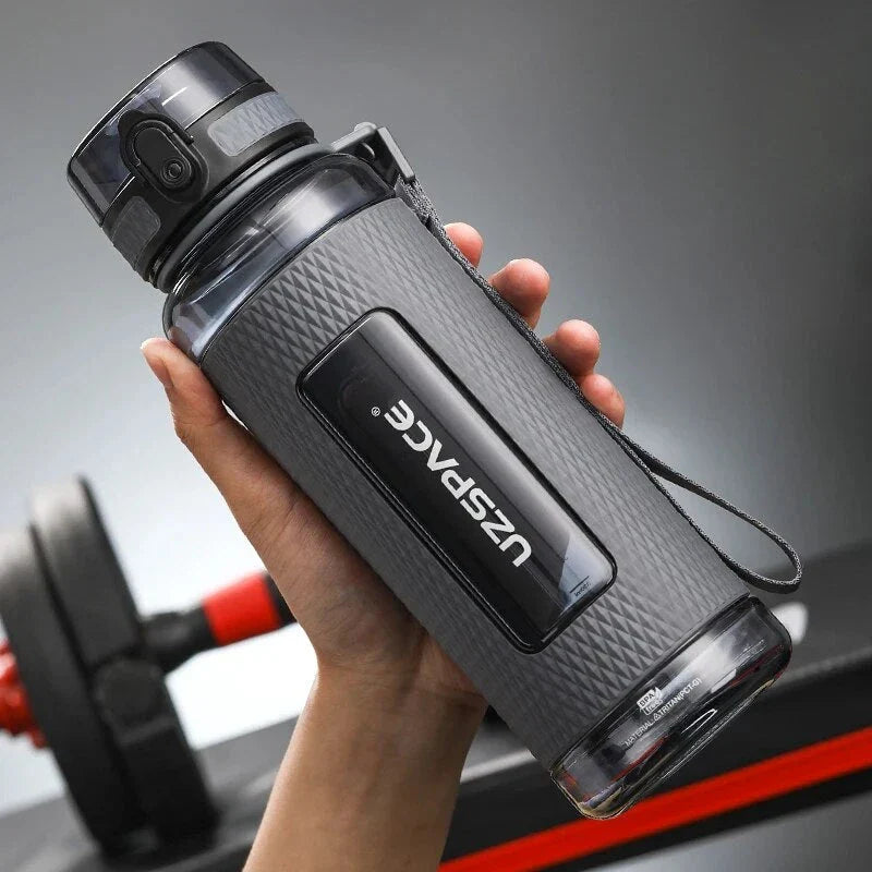Portable sports water bottle with wide mouth, tea infuser, and leak-proof design for active lifestyles