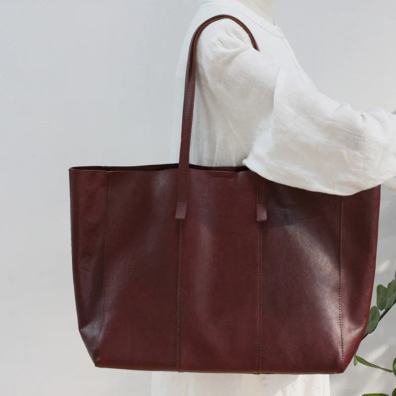 Premium leather handbag with multiple pockets and compartments for exceptional organization and style