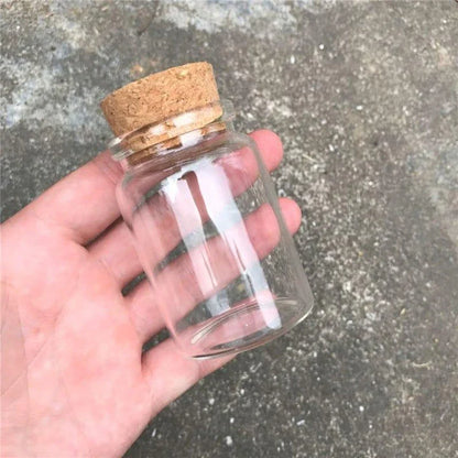 Premium glass spice jar with cork lid for organizing and storing spices, herbs, and seasonings in a modern, minimalist kitchen