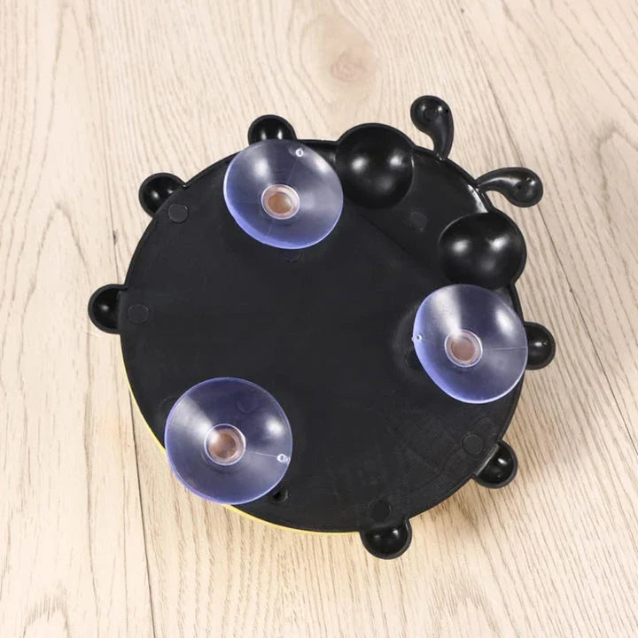 Colorful ladybug-shaped toothbrush holder with suction cup for easy wall mounting and organized storage