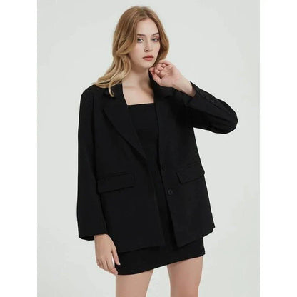 Elegant women's black blazer coat with a turn-down collar, single-breasted closure, and practical pockets for a polished, professional look.