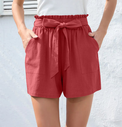 Ruffle bow waist tie shorts in black, made of lightweight and breathable polyester fabric, with convenient pockets for storage