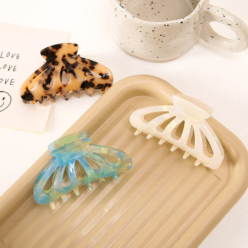Stylish geometric hollow stripes hair barrettes in beige color, a fashionable accessory to elevate any hairstyle