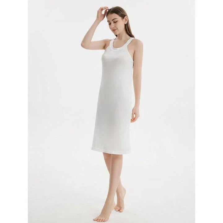 Elegant silk-blend halter neck midi dress in green and white colors, showcasing a chic and versatile design for modern American women.
